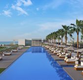 Emiraty - The Oberoi Beach Al Zorah - Main_Pool_Day_Angle